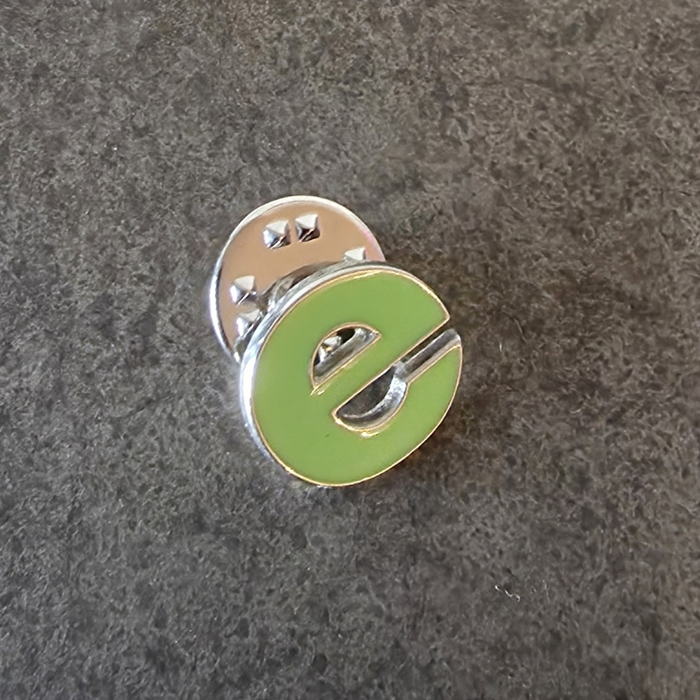 Green "E" Enamel Pin